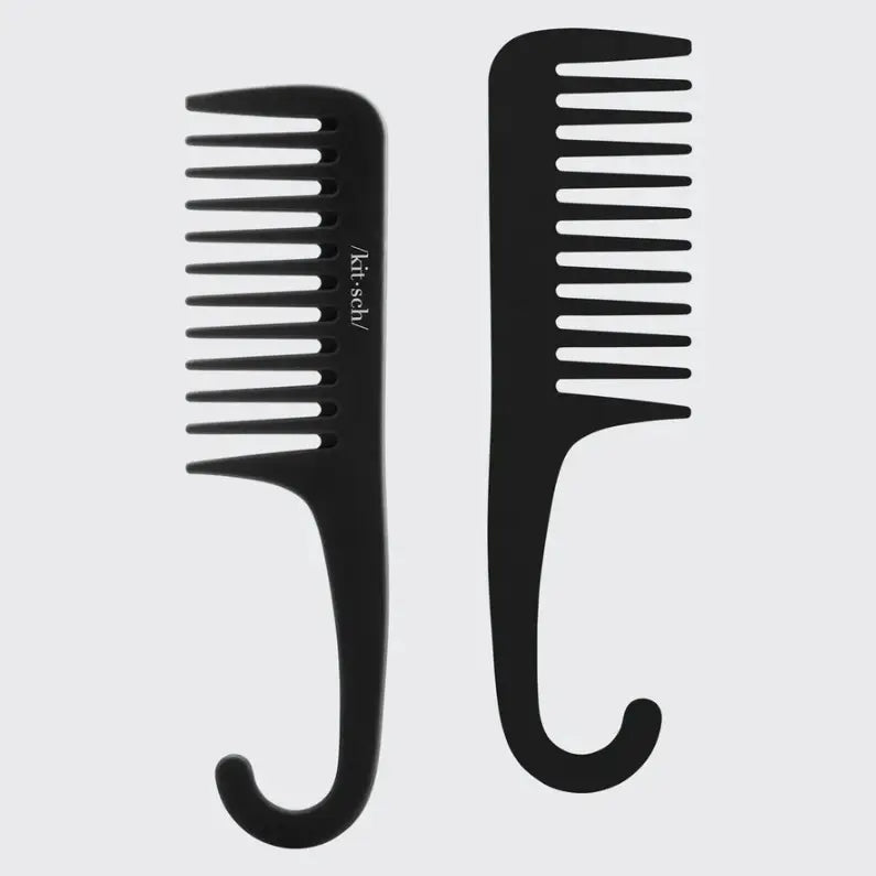 Two black Kitsch Detangle Combs on a light gray background
