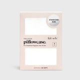 Package of satin pillowcase with branding and product details on a white background