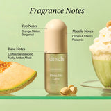 Kit-sch Pistachio Latte hair perfume bottle with fragrance notes and related items on a green background