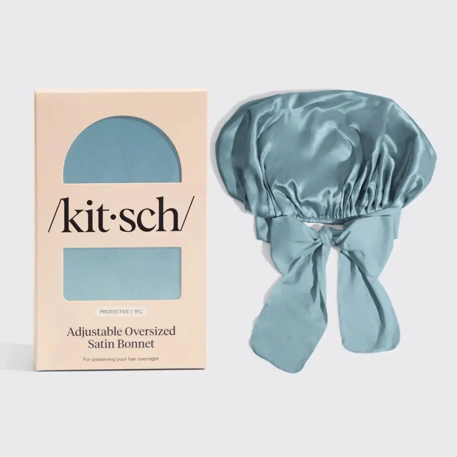Blue satin bonnet with packaging labeled 'kitsch' on a light gray background