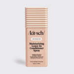A bottle of Kitsch Detangling Moisturizing Leave-in Conditioner Spray in a light peach-beige color, shown on a light gray background.