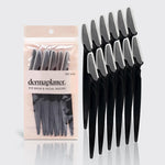 Set of black dermaplaning razors with packaging on a white background