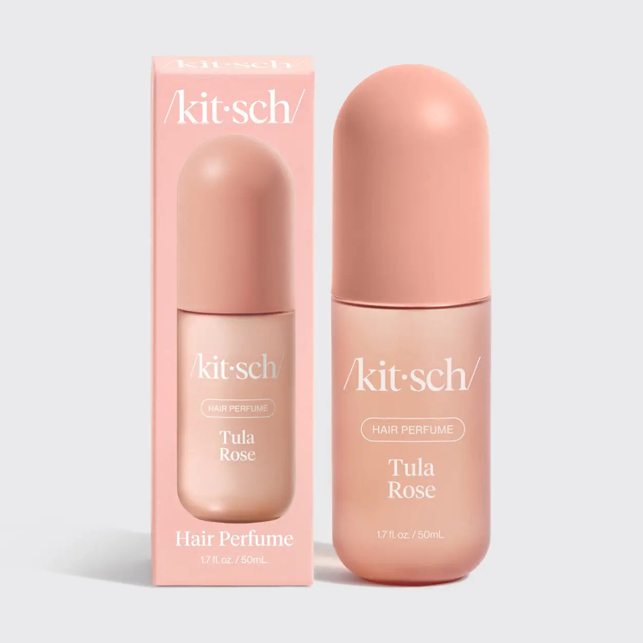 Kit-sch Tula Rose hair perfume bottle and packaging on a light gray background