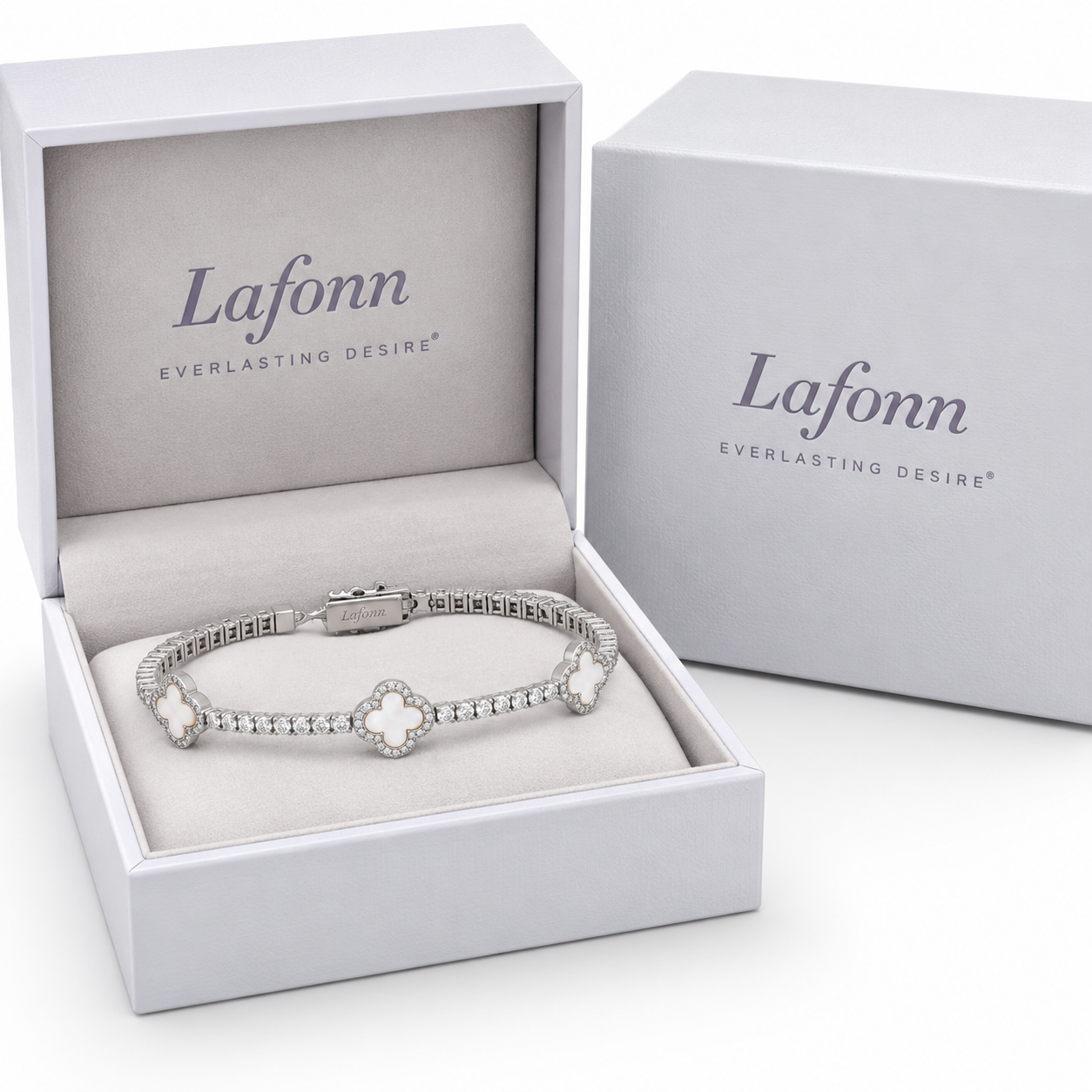 Lafonn flexible tennis bracelet with mother-of-pearl good-luck symbols displayed in a Lafonn jewelry box.