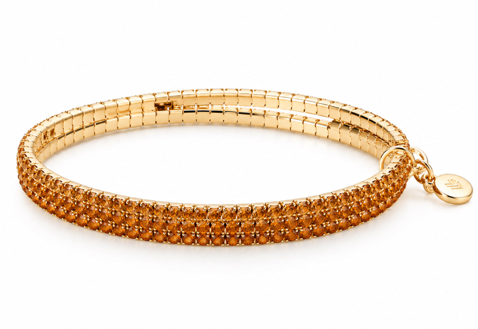 Lizas Hanson Topaz Bracelet with topaz-colored accents and polished gold-tone finish.