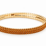 Lizas Hanson Topaz Bracelet with topaz-colored accents and polished gold-tone finish.