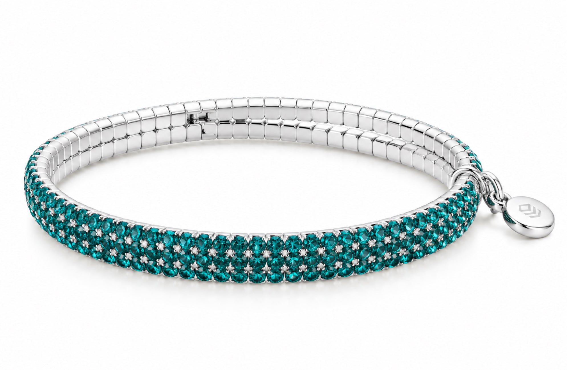 Lizas Hanson Teal Bracelet with teal accents and a polished silver-tone multi-row flexible design