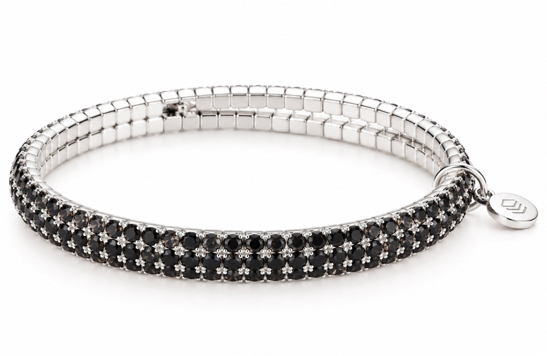 Lizas Hanson Black Diamond Bracelet with shimmering black accents and a polished silver-tone flexible bangle design.