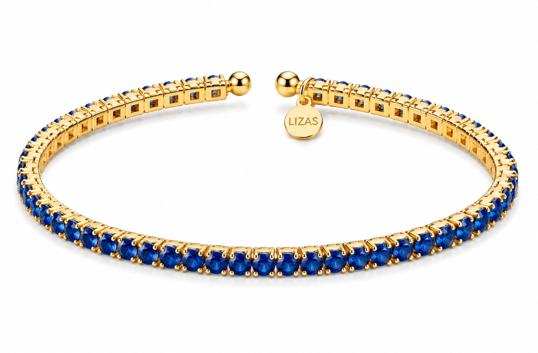 Lizas Denver Azure Bracelet with blue stones and a polished gold finish on a white background.