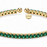 Lizas Denver Smaragd Green Bracelet with faceted emerald green Czech crystals and a polished gold finish on a white background.