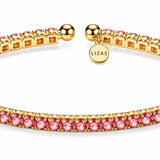 LIZAS Denver Rose tennis bracelet with faceted pink Czech crystals, polished gold finish, and LIZAS charm.
