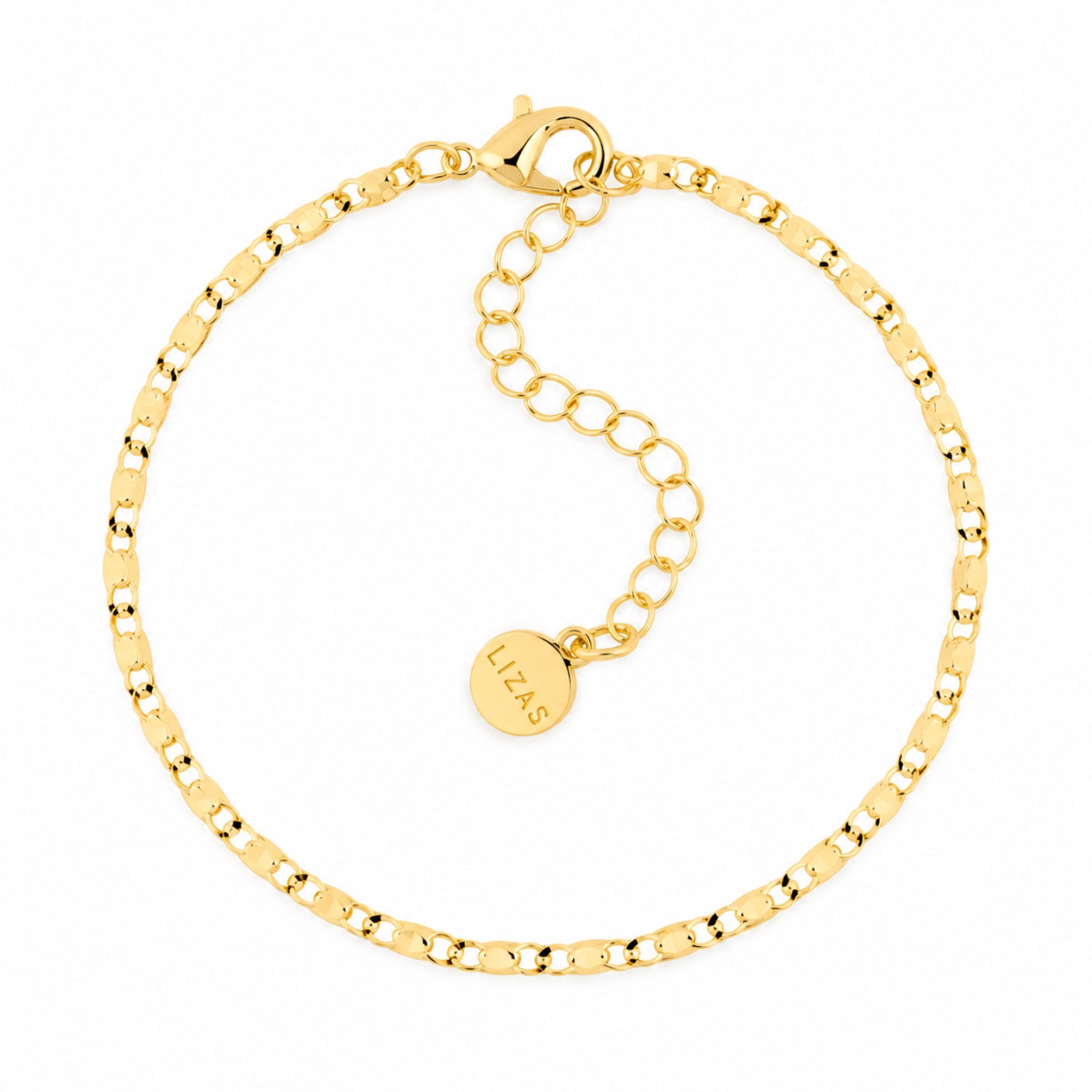 LIZAS Charleston gold chain bracelet with polished links, lobster clasp, adjustable extender chain, and round LIZAS charm.