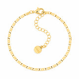 LIZAS Charleston gold chain bracelet with polished links, lobster clasp, adjustable extender chain, and round LIZAS charm.