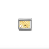 Gold and silver charm with lattice design on a white background
