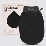A black exfoliating glove from the brand kit-sch, shown next to its light pink packaging box on a light gray background.
