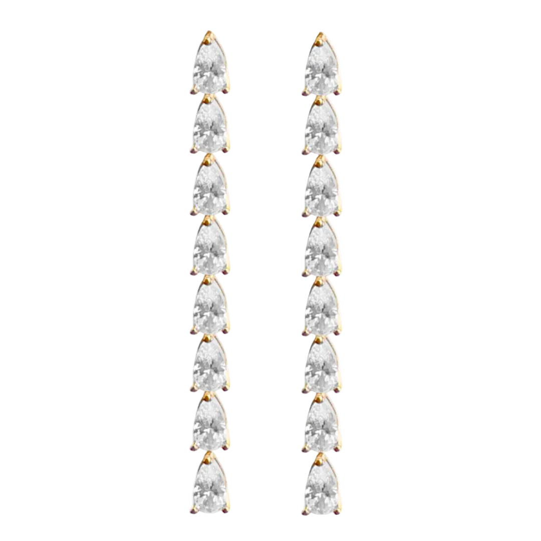 Long, teardrop-shaped earrings with clear stones on a white background