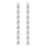 Long, teardrop-shaped earrings with clear stones on a white background