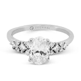 14k Gold .10ct Oval Diamond Sidestone Engagement Ring