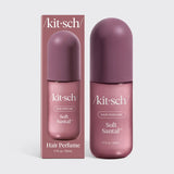 Kit-Sch Soft Santal hair perfume shown with its retail box and matching bottle, both in a dusty mauve-pink color, on a light gray background.