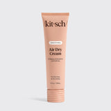 Kit-sch Air Dry Cream tube on a light gray background
