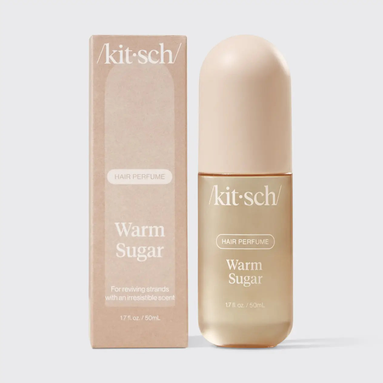 Kit-sch Warm Sugar hair perfume bottle and packaging on a light gray background
