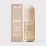 Kit-sch Warm Sugar hair perfume bottle and packaging on a light gray background