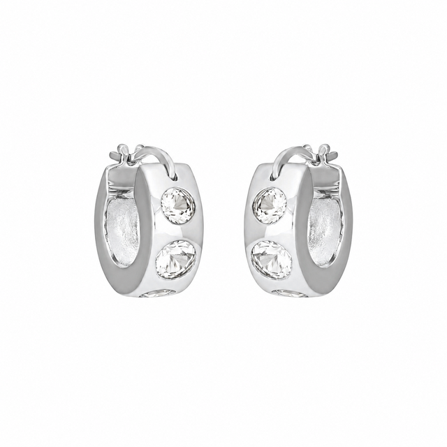 Silver FYB crystal huggie hoop earrings with clear CZ accents on a white background.